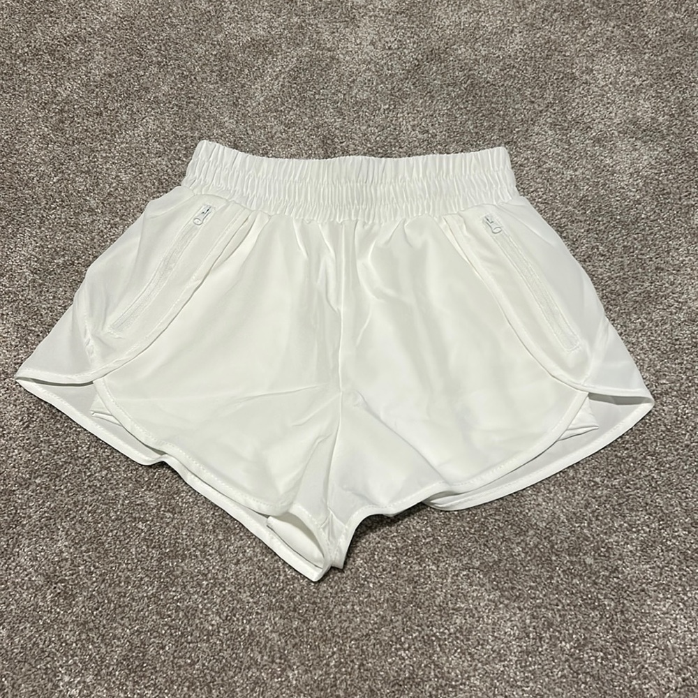 White athletic shorts. Size small/4